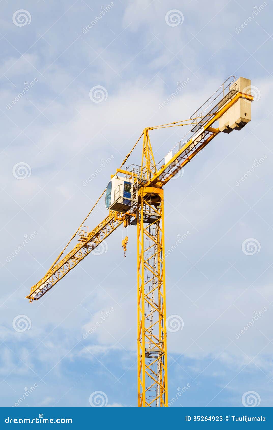 yellow stationary hoist crane
