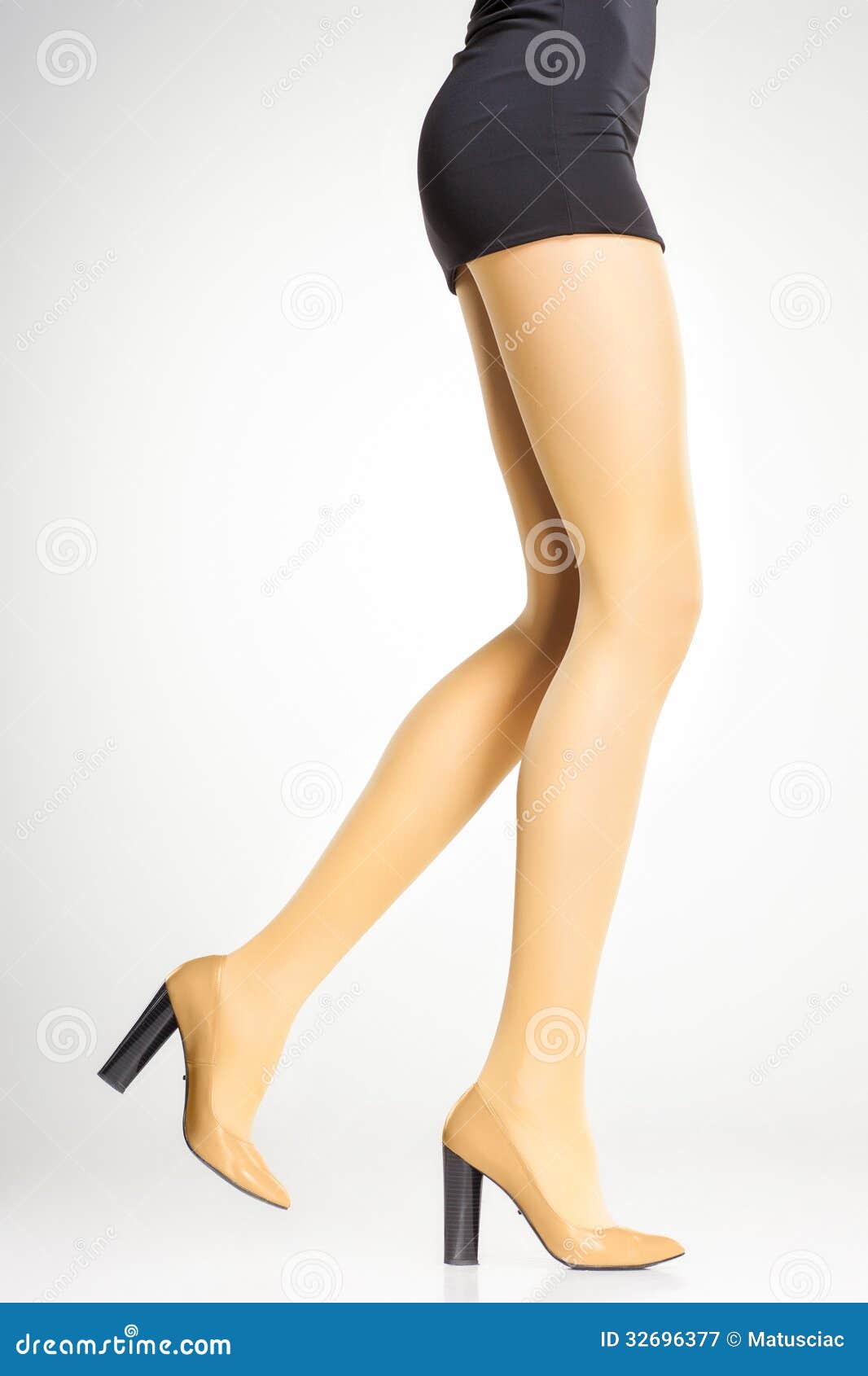 Yellow Stockings On Woman Legs On Grey Royalty Free Stock Photography ...