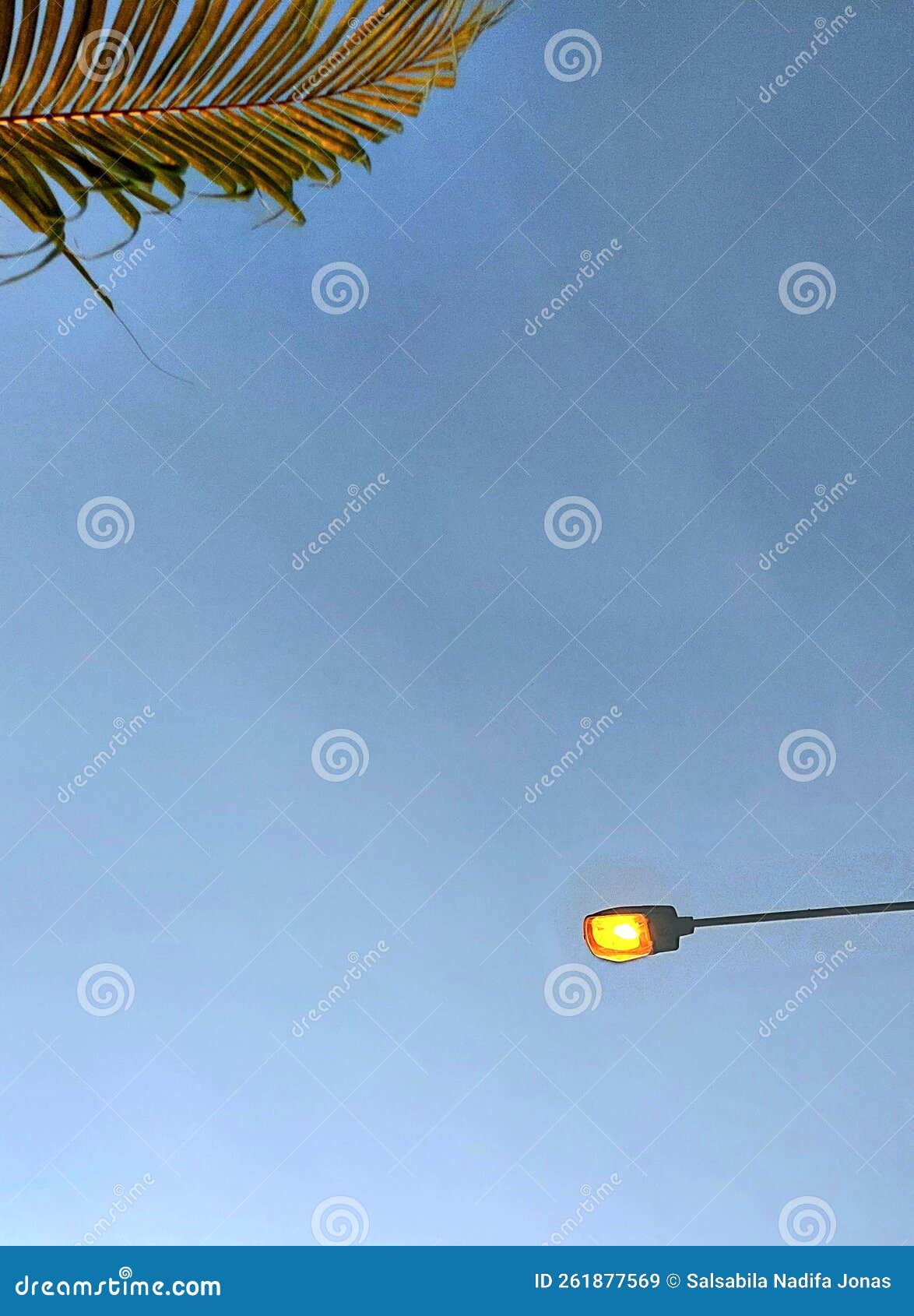A Yellow Street Light is Shining in the Afternoon. Stock Image Image