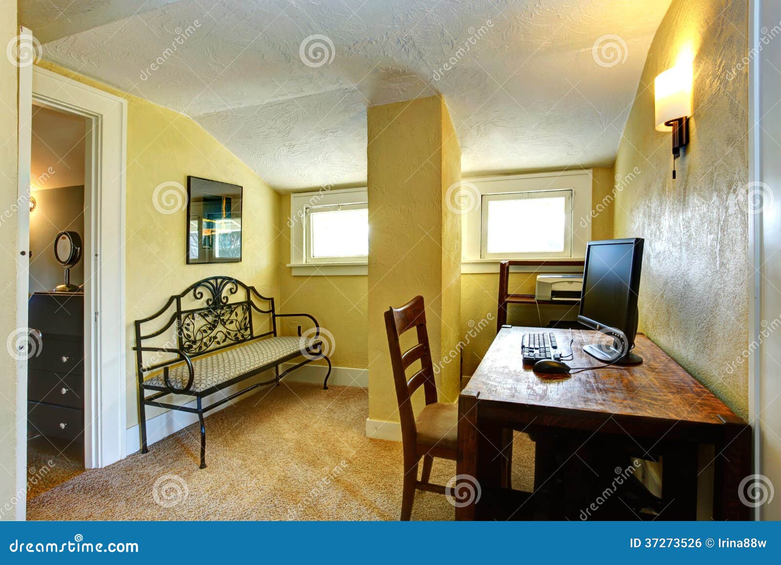 Yellow Study Room With Column And Vaulted Ceiling Stock Photo