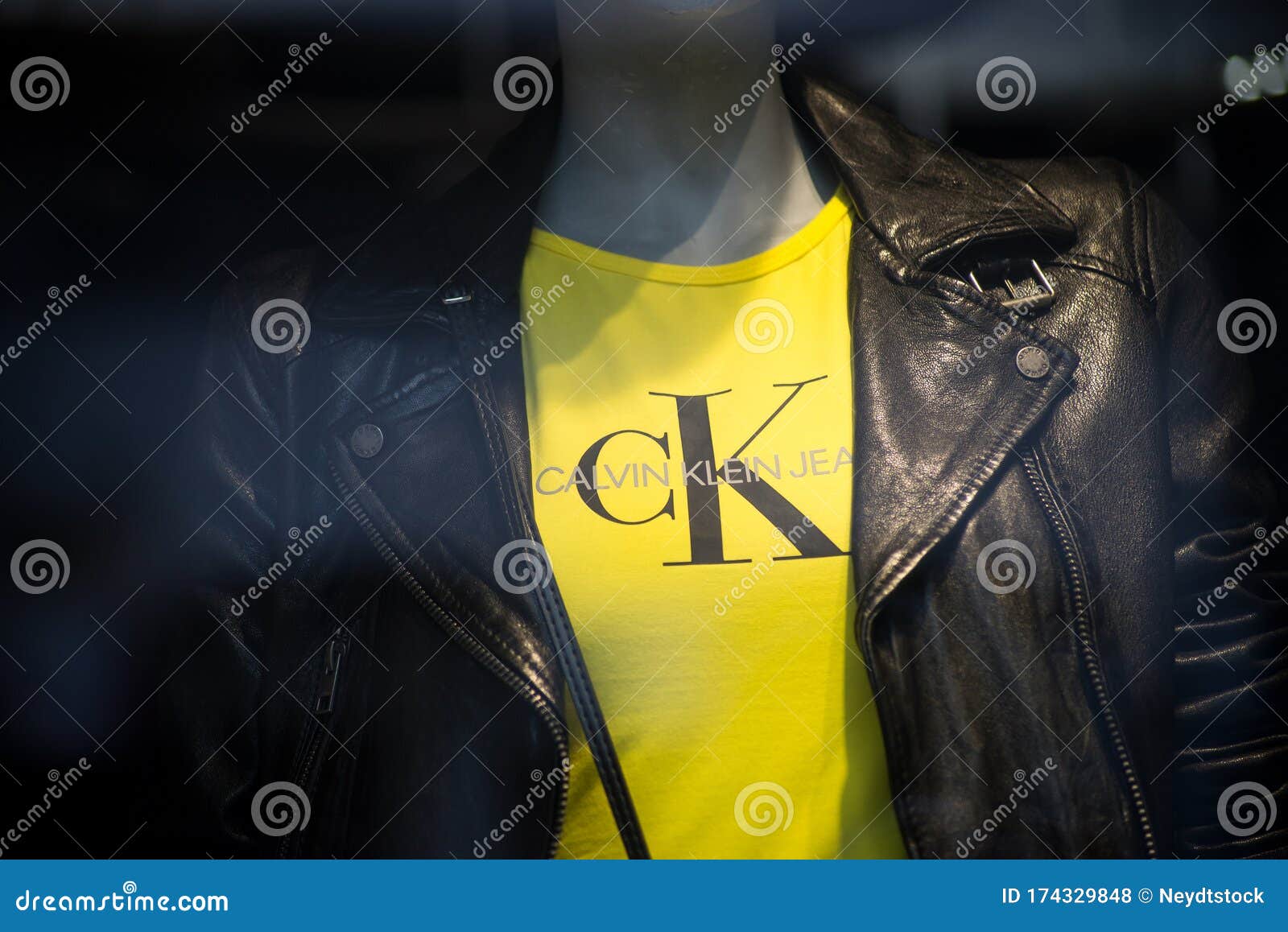 Yellow Tee Shirt by Calvin Klein on Mannequin in a Fashion Store ...