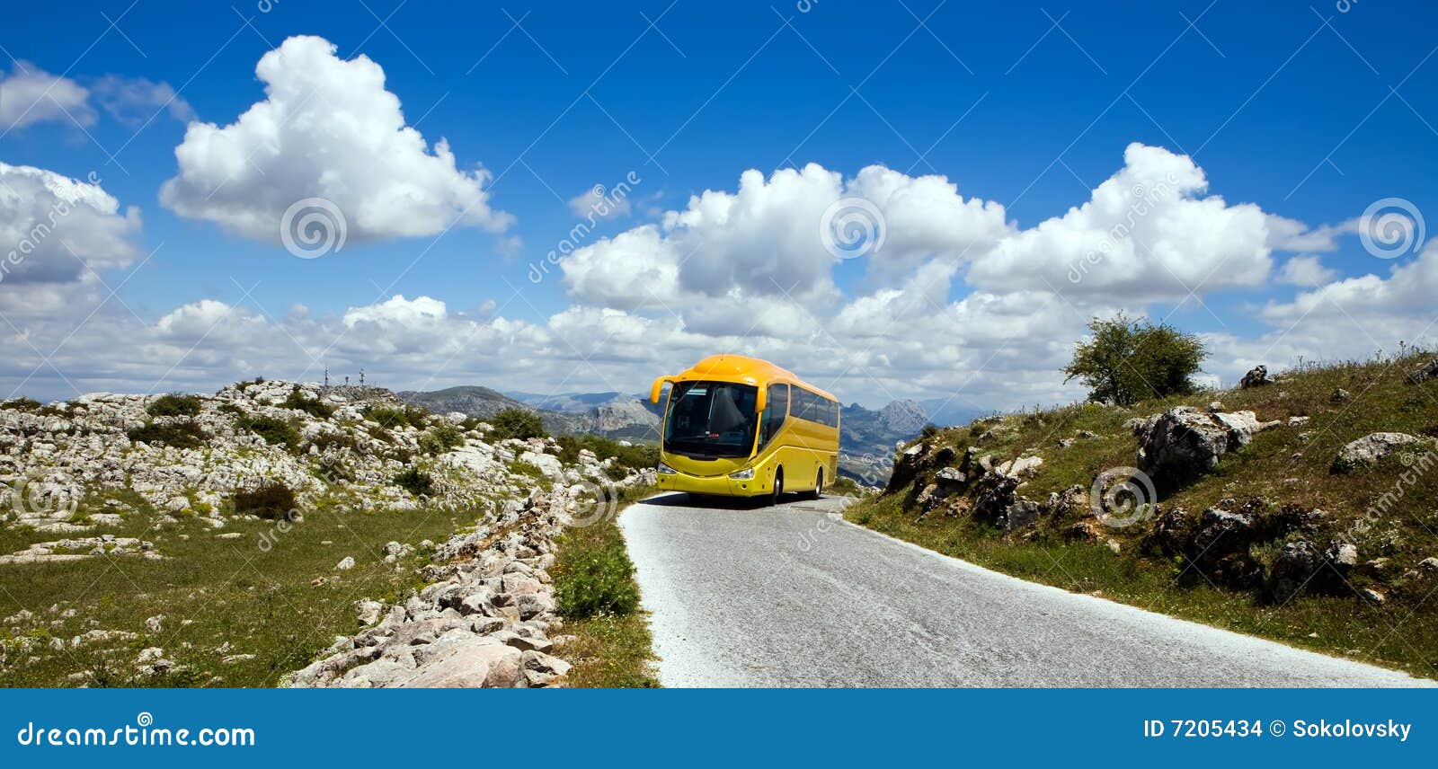 yellow tourist bus in nature reserve el torcal