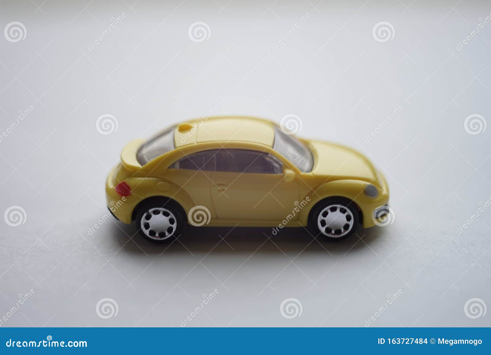 Yellow Toy Car on White Surface, Side View Stock Photo Image of wheel