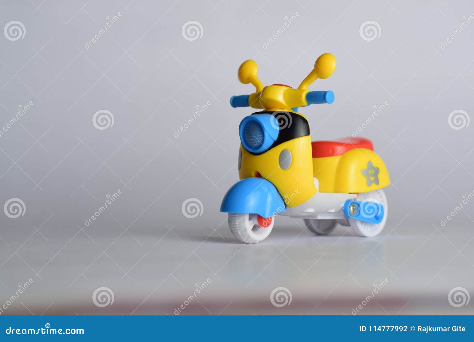 Yellow toy scooter stock photo. Image of cute, design 114777992
