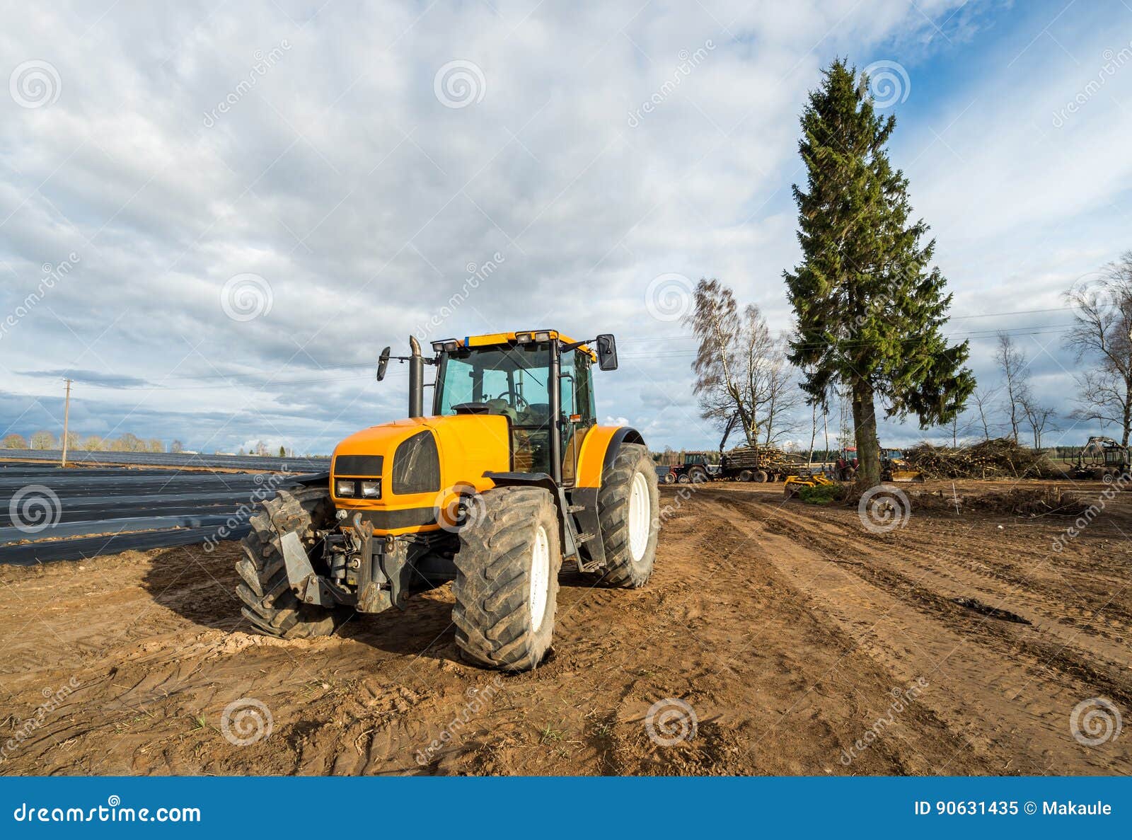 Yellow tractor stock image. Image of industry, farm, plastic 90631435