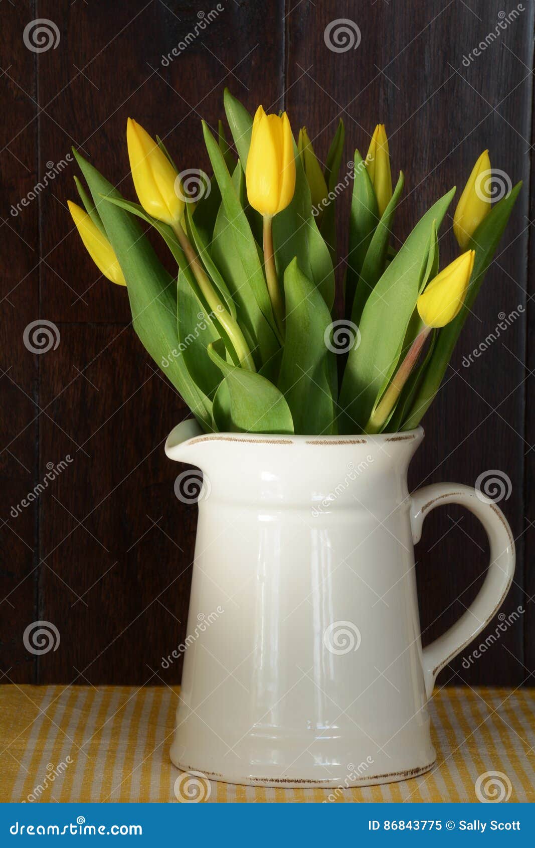 Yellow tulips in white jug stock image. Image of rustic - 86843775