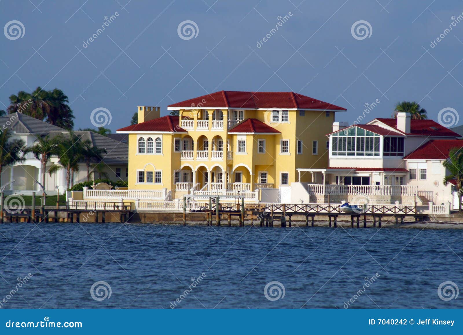 yellow waterfront home.