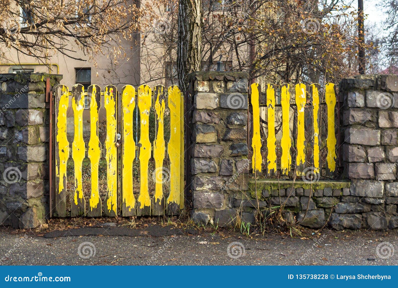 Yellow wooden gate stock photo. Image of city, countryside - 135738228