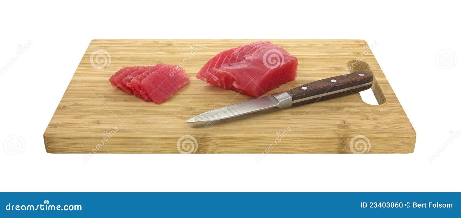 Yellowfin tuna with knife stock photo. Image of handle 23403060