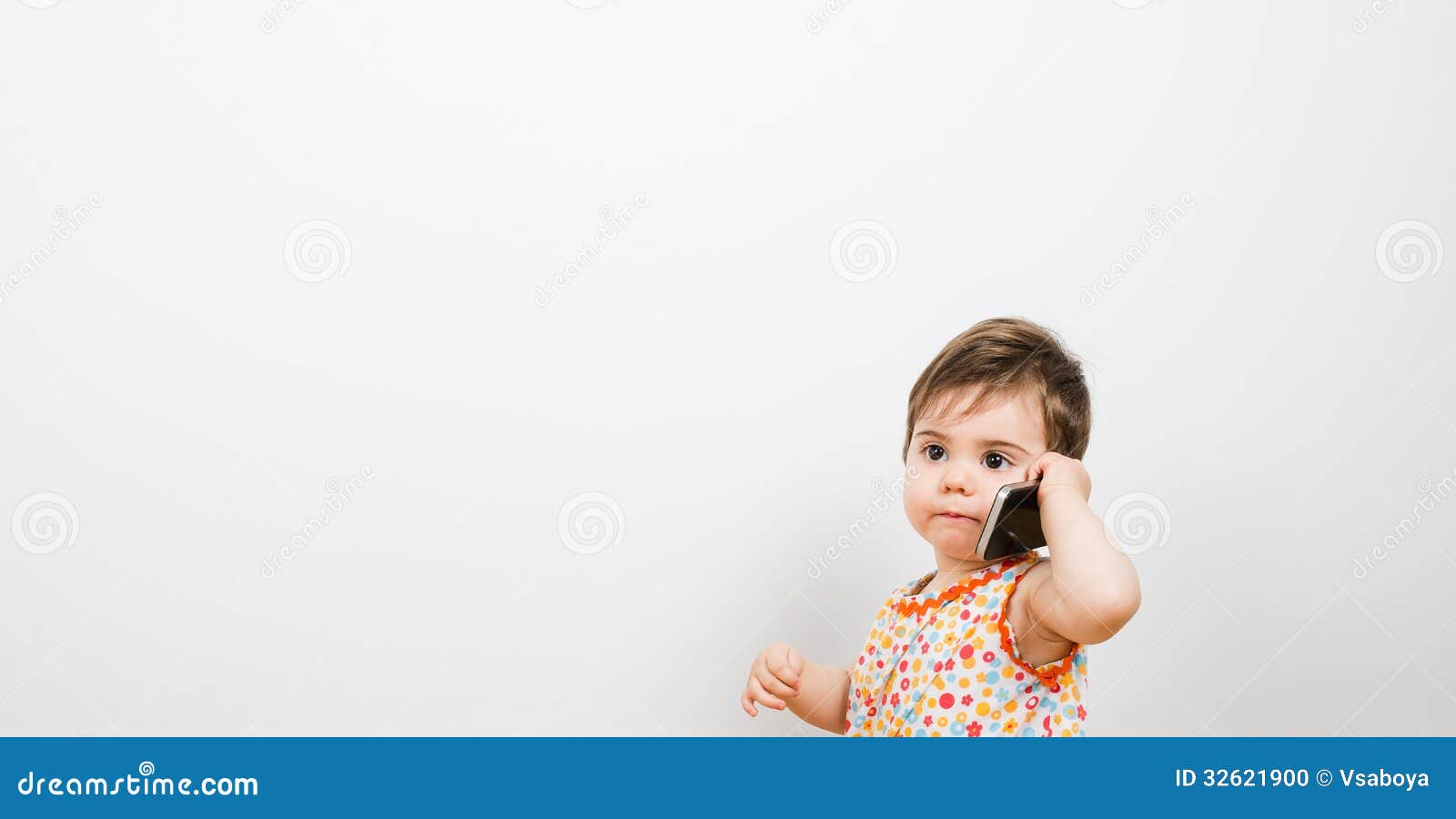 Yes? Baby calling stock photo. Image of portrait, concentration 32621900