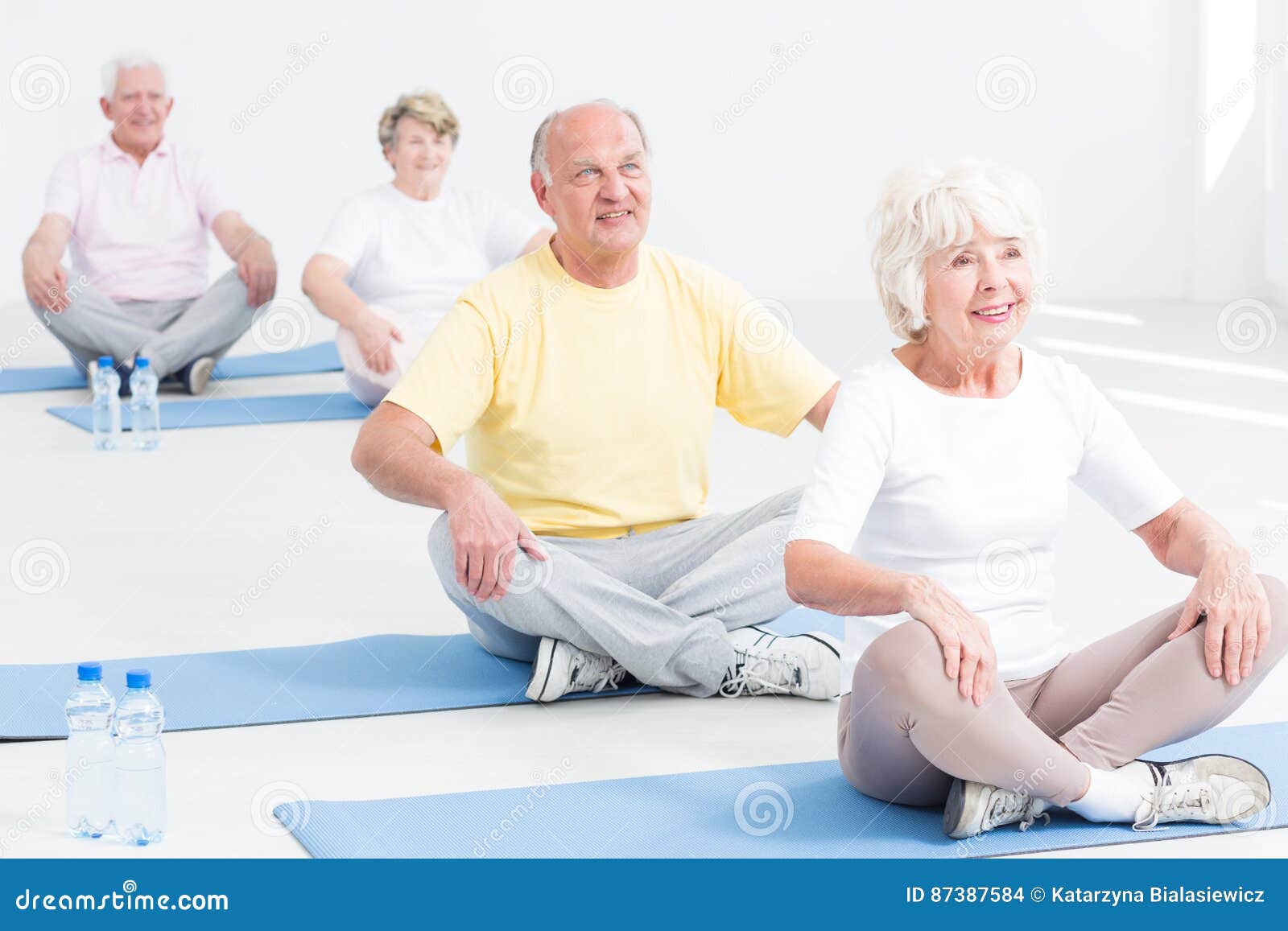 Yoga class for seniors stock photo. Image of equipment 87387584