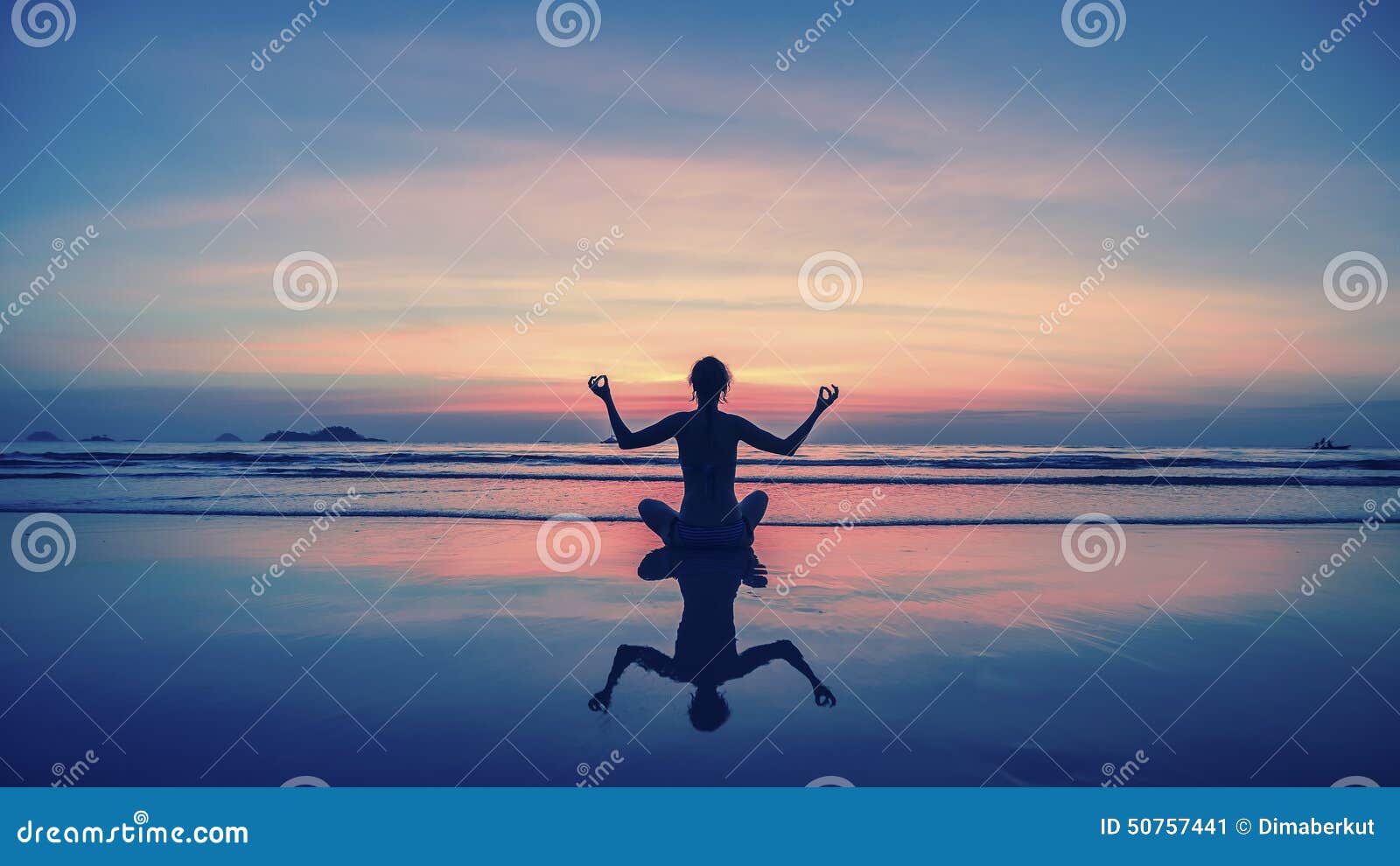 yoga, fitness, healthy lifestyle. silhouette meditation girl on the background of the stunning sea and sunset.