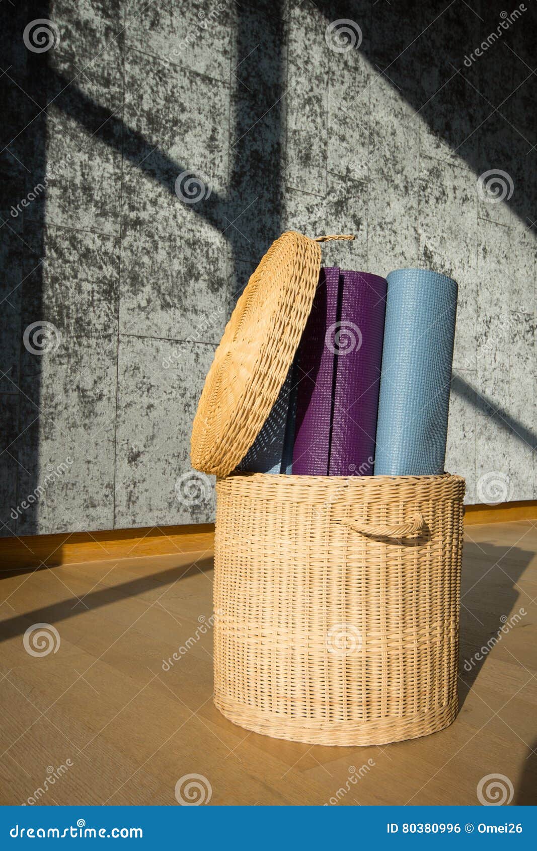 Yoga mat in the basket stock photo. Image of leisure 80380996