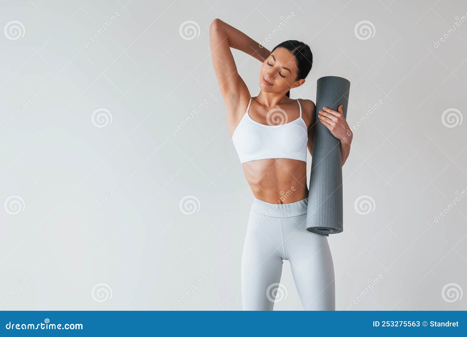 With Yoga Mat. Woman with Sportive Slim Body Type in Underwear