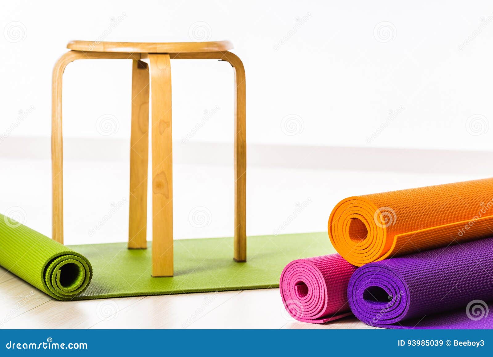 Yoga mats and chairs stock image. Image of mats, material 93985039