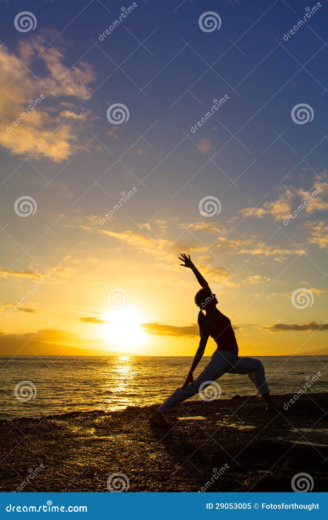 Yoga by the Ocean stock image. Image of gold, people 29053005