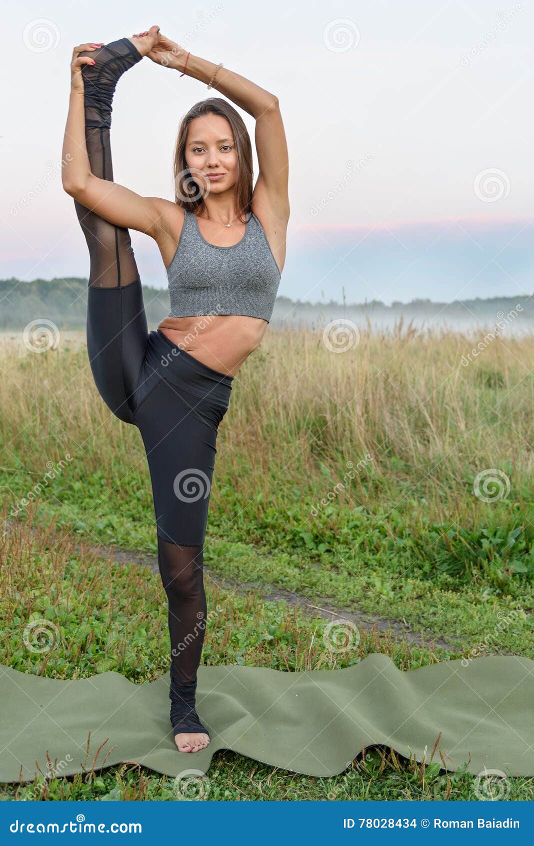 Young Blond Woman Standing in Yoga Pose on One Leg with Hands Up As in  Prayer Stock Image - Image of park, backyard: 278809755