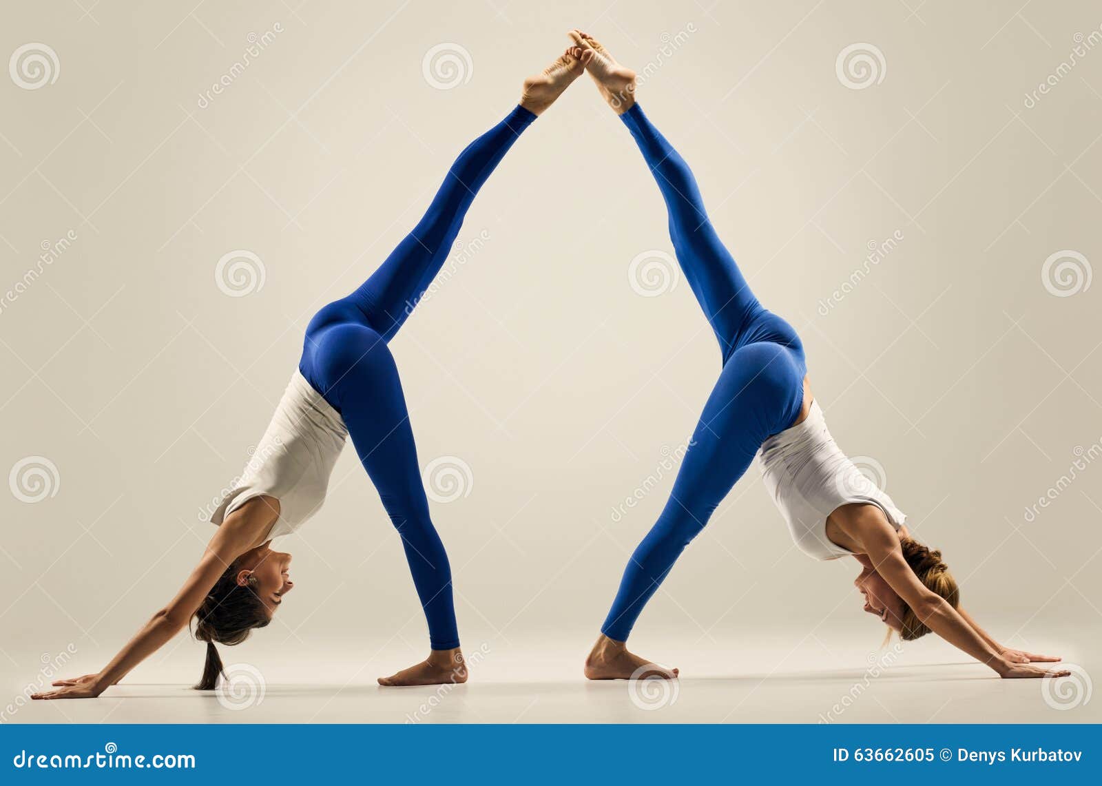 Yoga In Pair. Balance. Splits. Leg High Stock Photo - Image: 63662605