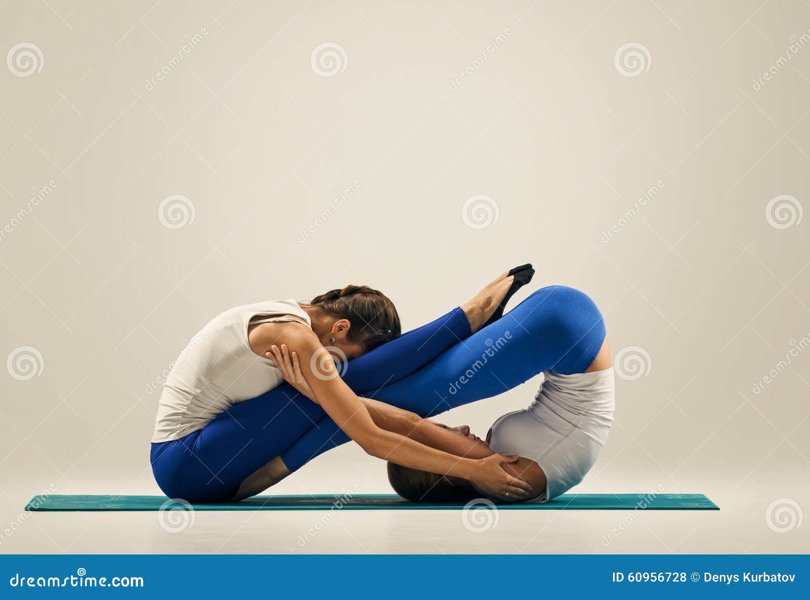 Yoga in pair. floor stock photo. Image of balance, adult - 60956728