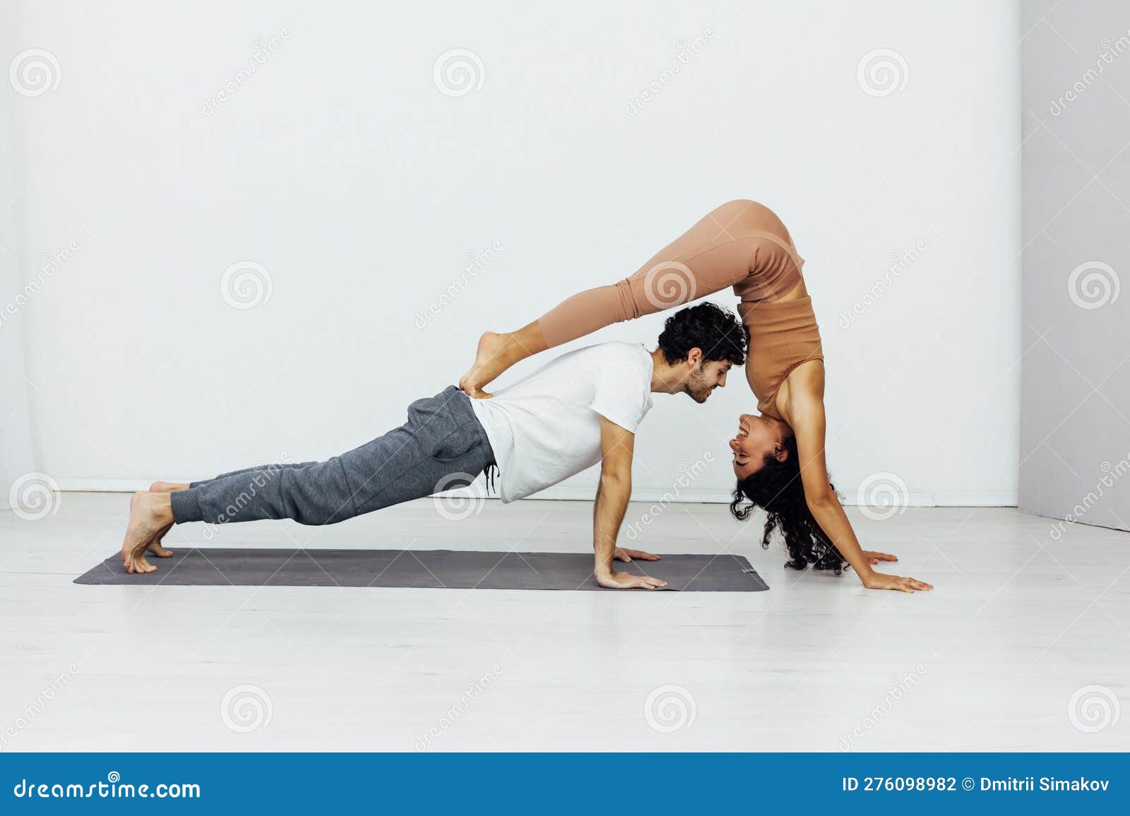 Man and woman paired family yoga asana gymnastics fitness Stock Photo -  Alamy