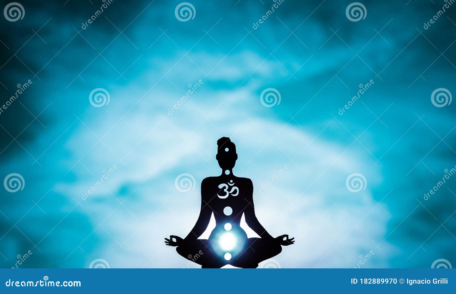 yoga position silhouette in contrasting sun, throat chakra