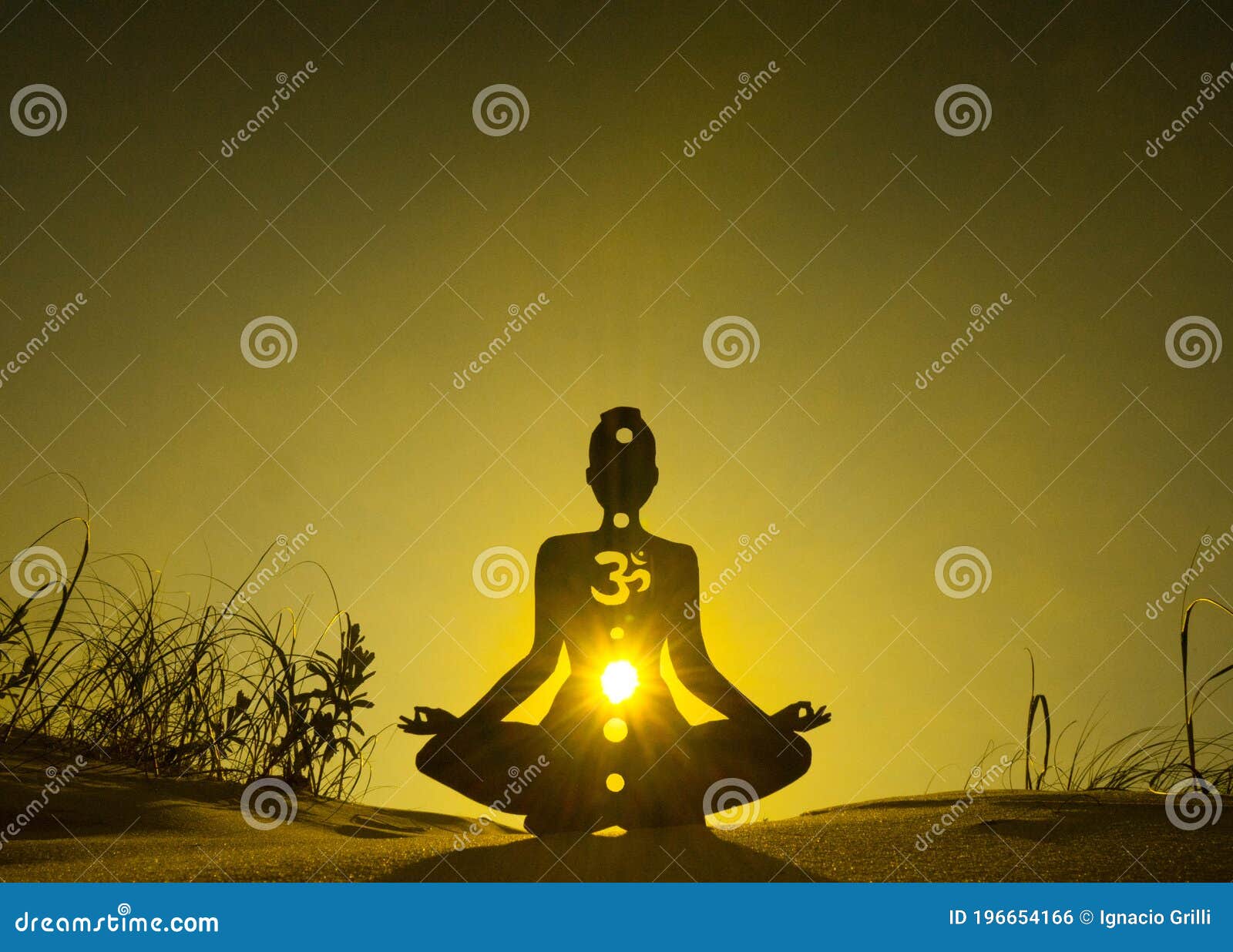 yoga position silhouette in contrasting sun, solar plexus chakra