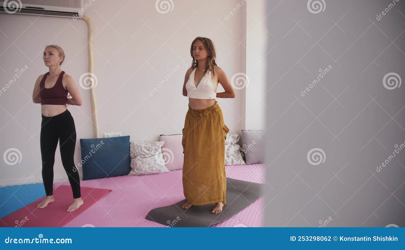 Yoga Session Three Women Do Yoga in the Studio in Daylight Stock