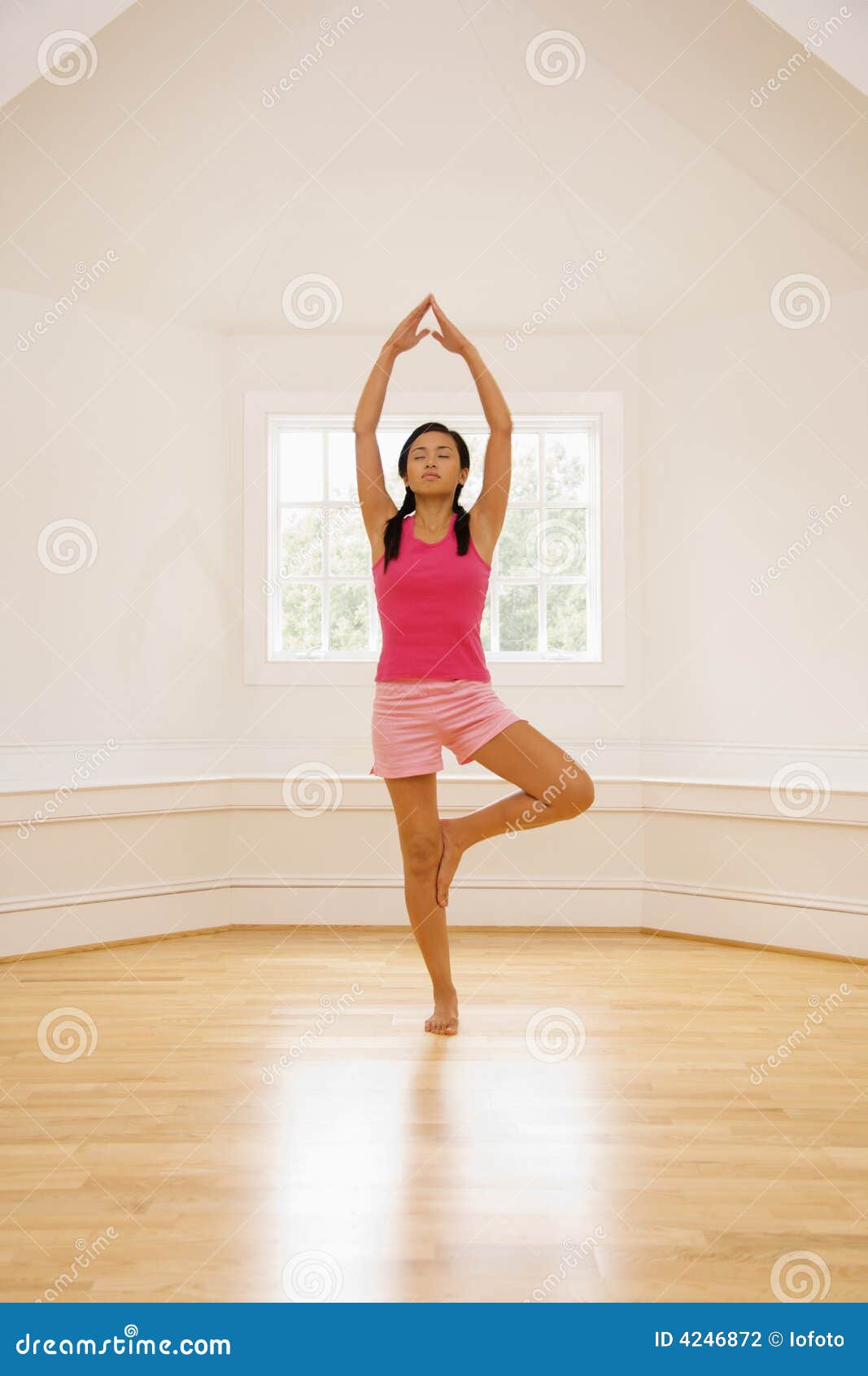 yoga tree pose woman
