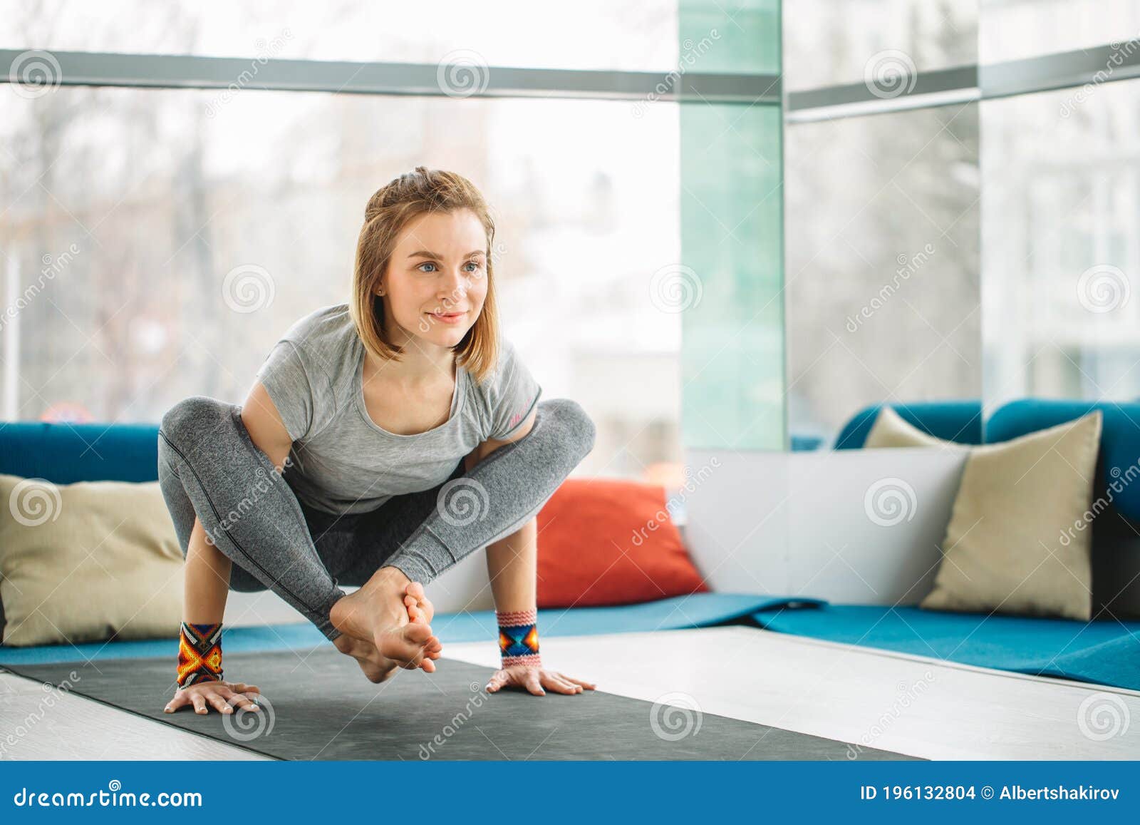 Yoga Woman Doing Balance Handstand Pose Exercises at Gym Stock Photo ...