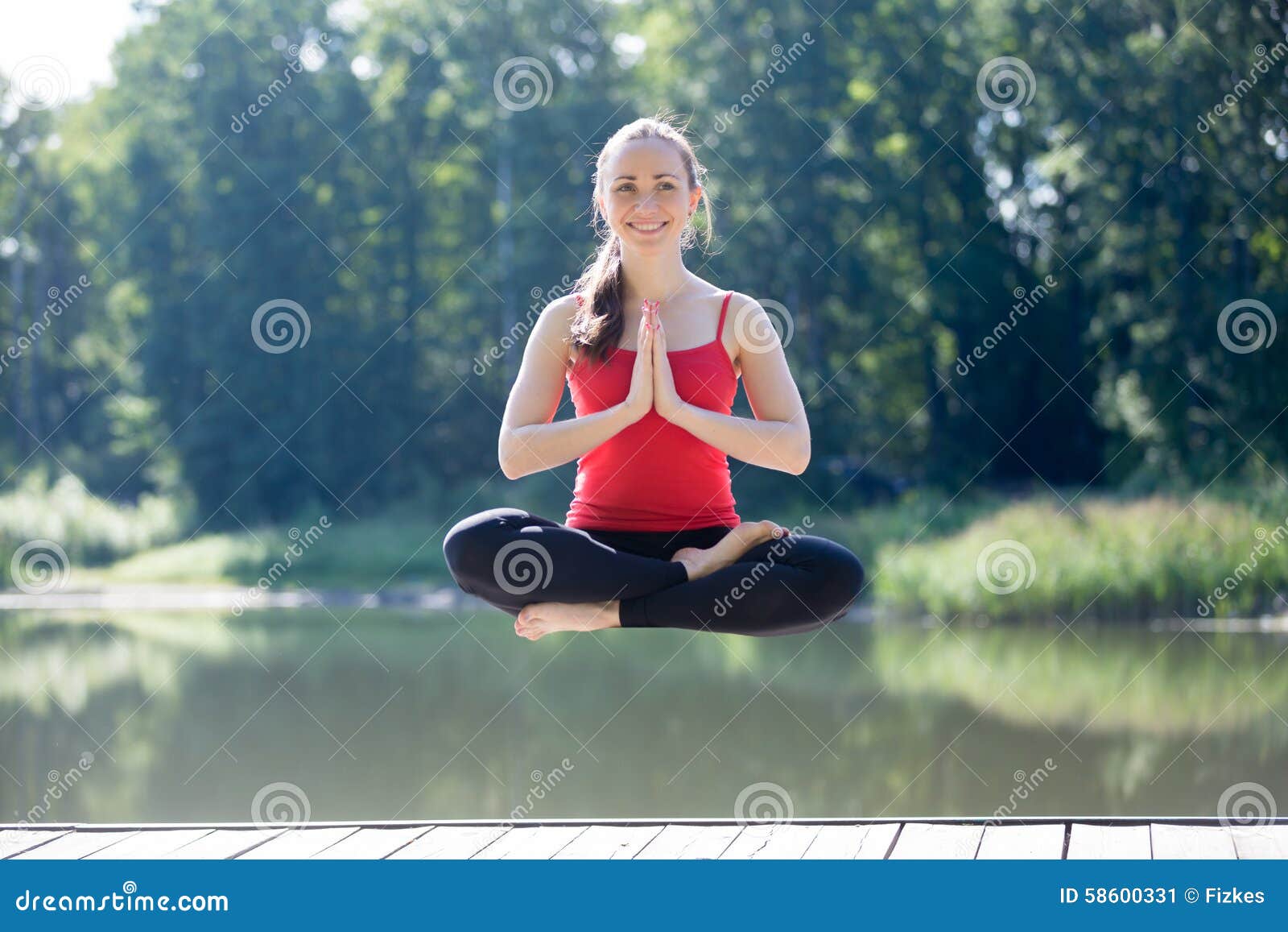 Young Athletic Woman Sitting In Lotus Pose Underwater In Swimming Pool  Stock Photo - Download Image Now - iStock