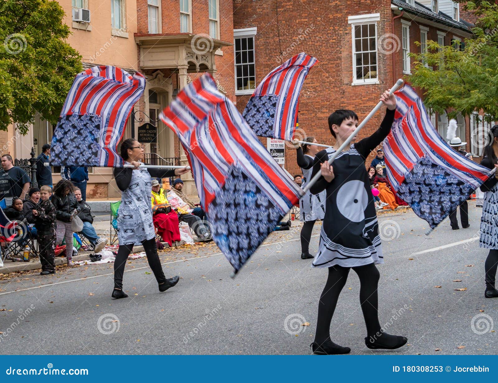 YORKOCTOBER 28, 2018 Flag Waving Majorettes in Halloween Parade in
