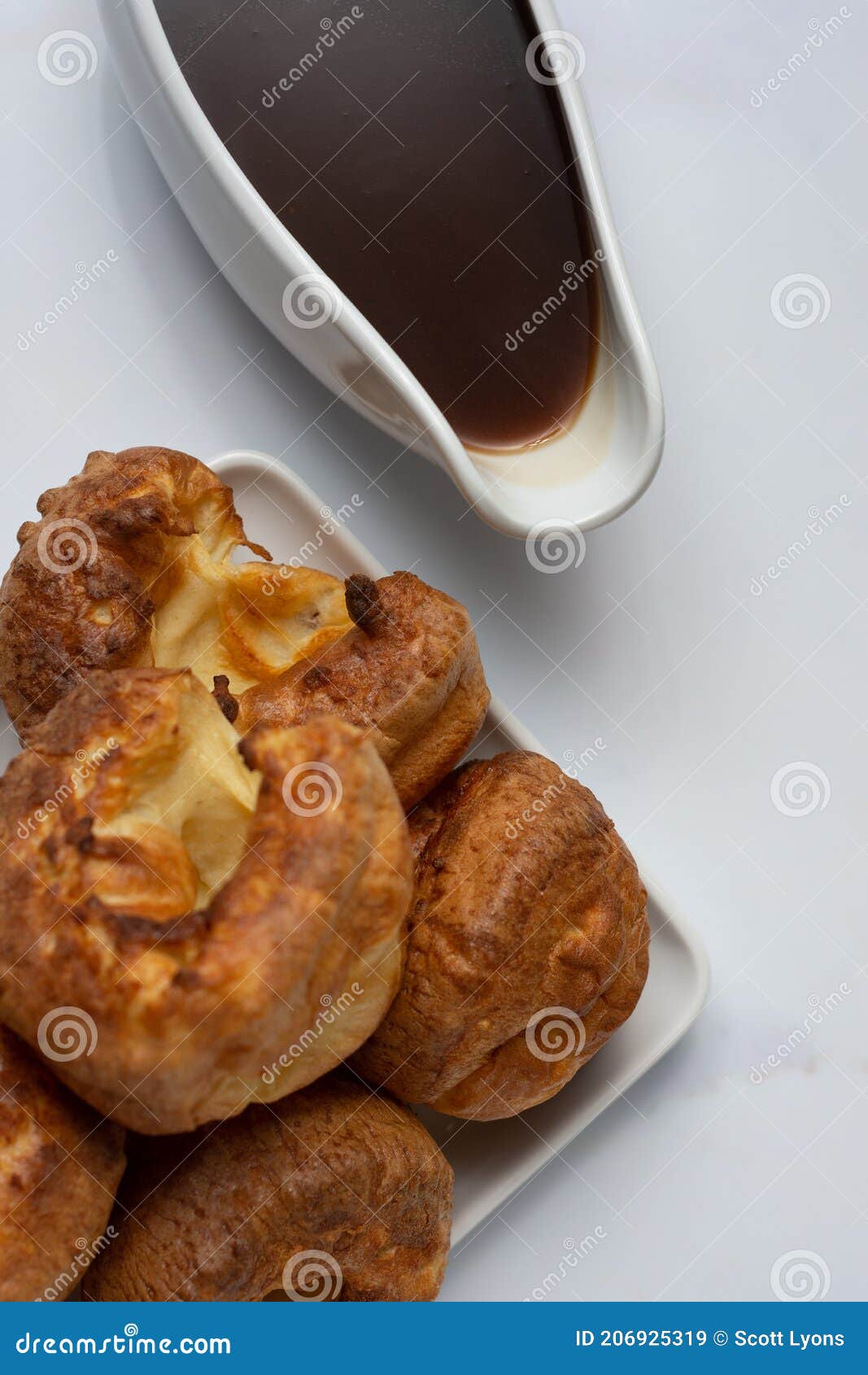 Yorkshire Pudding Stack Top Down with Gravy Boat Stock Image Image of