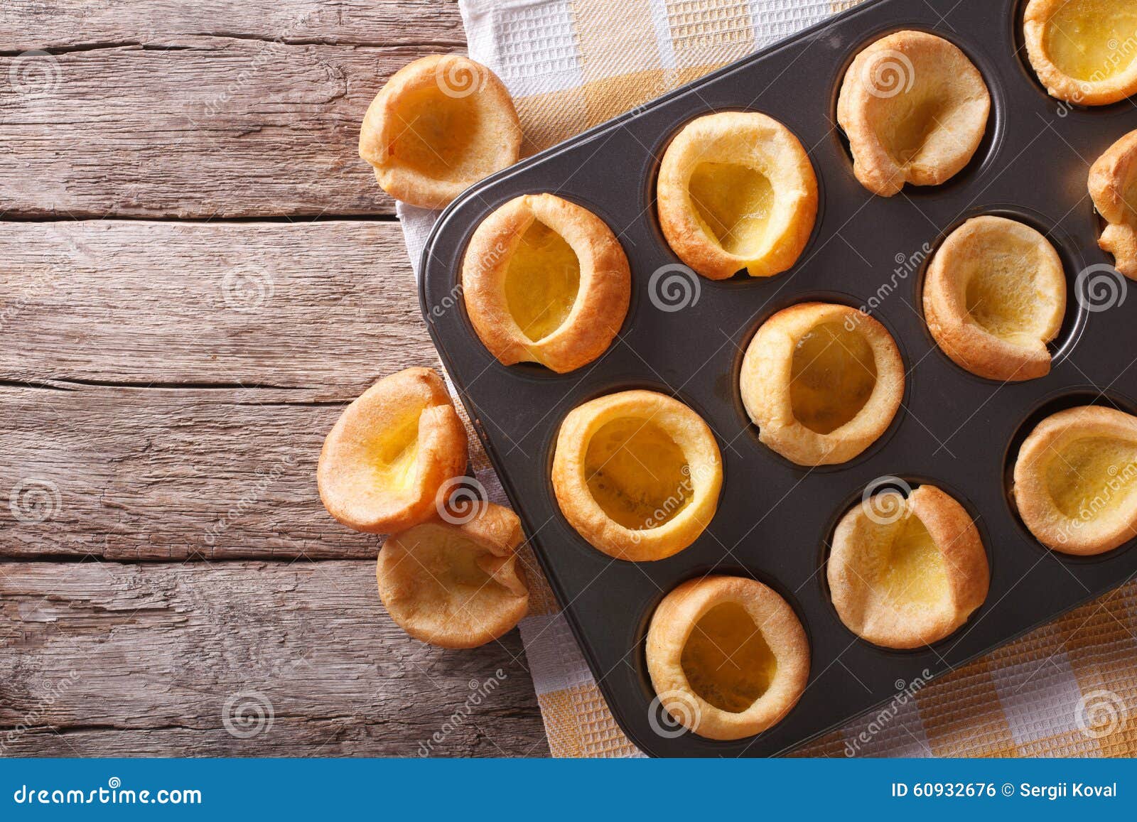 Yorkshire Puddings in Baking Dish on the Table. Horizontal Top V Stock