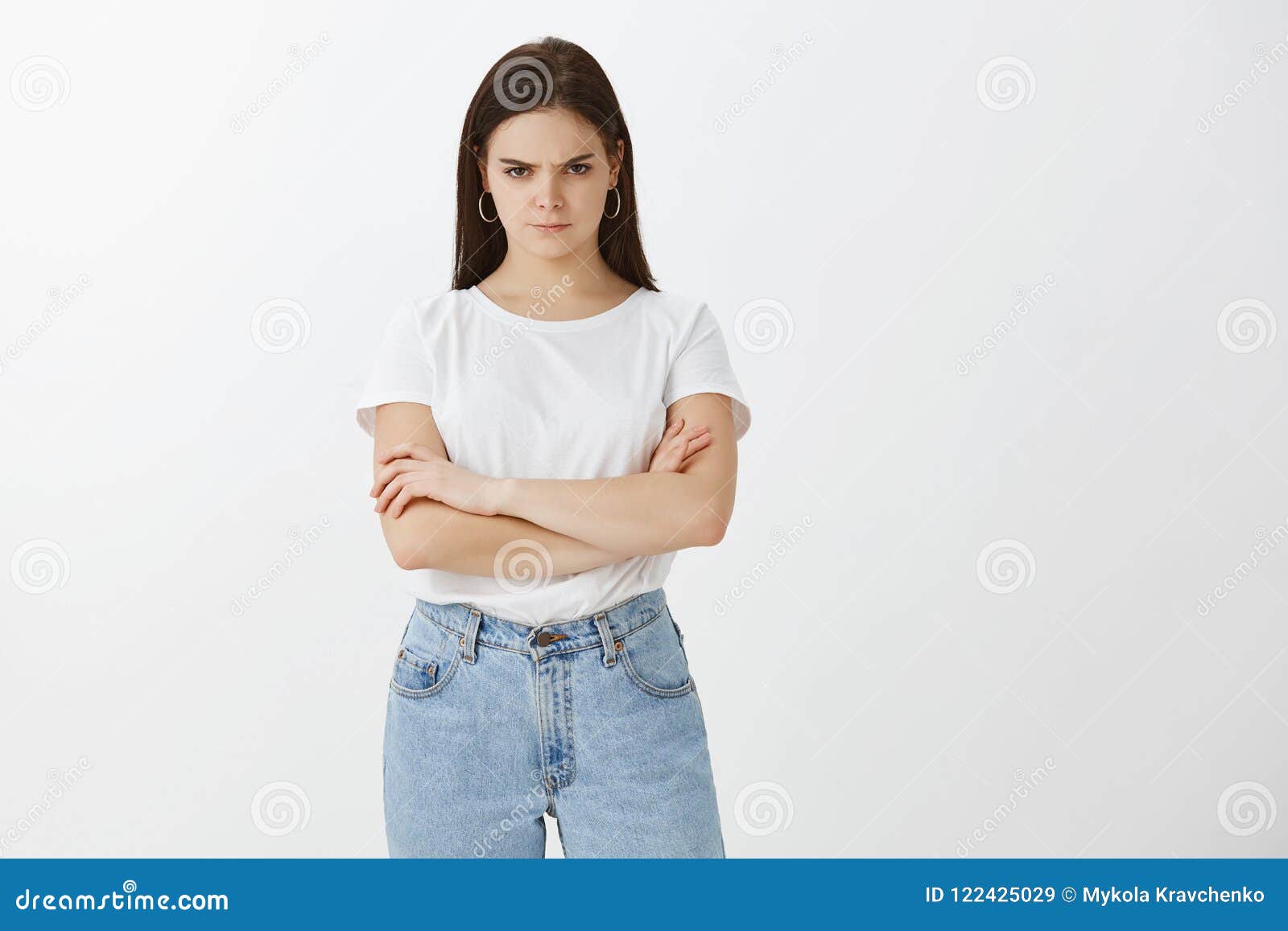 You Promised To Buy Me Car. Moody Good-looking Woman in Jeans and T-shirt, Looking from Under Forehead Stock Image Image grinning, advertising: 122425029