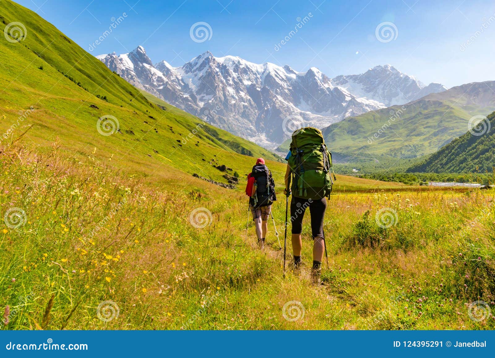 young active girls hiking in greater caucasus mountains, mestia district, svaneti, georgia