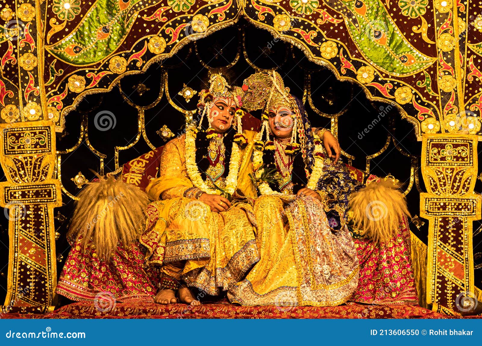 Young Actor Representing Krishna and Radha Marriage on Stage Editorial