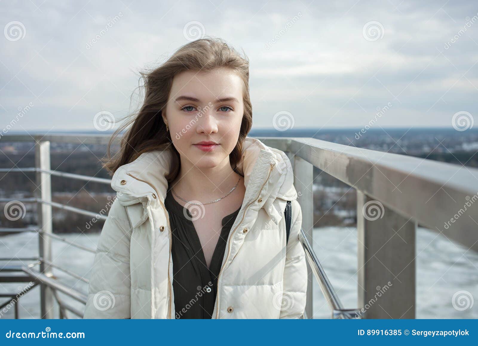 1300px x 957px - Young Adorable Smiling Blonde Teen Girl Having Fun on the Observation Deck  with a View of Cloudy Spring Sky, Frozen River, Sunny W Stock Image - Image  of portrait, height: 89916385