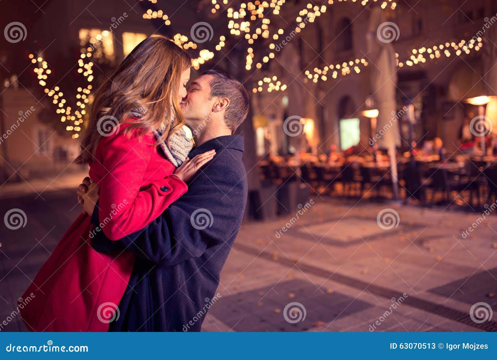 young affectionate couple kissing tenderly