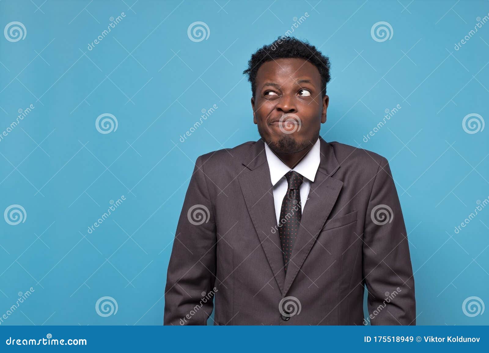 African American Businessman in Suit Looking Doubtful Having No Answer ...