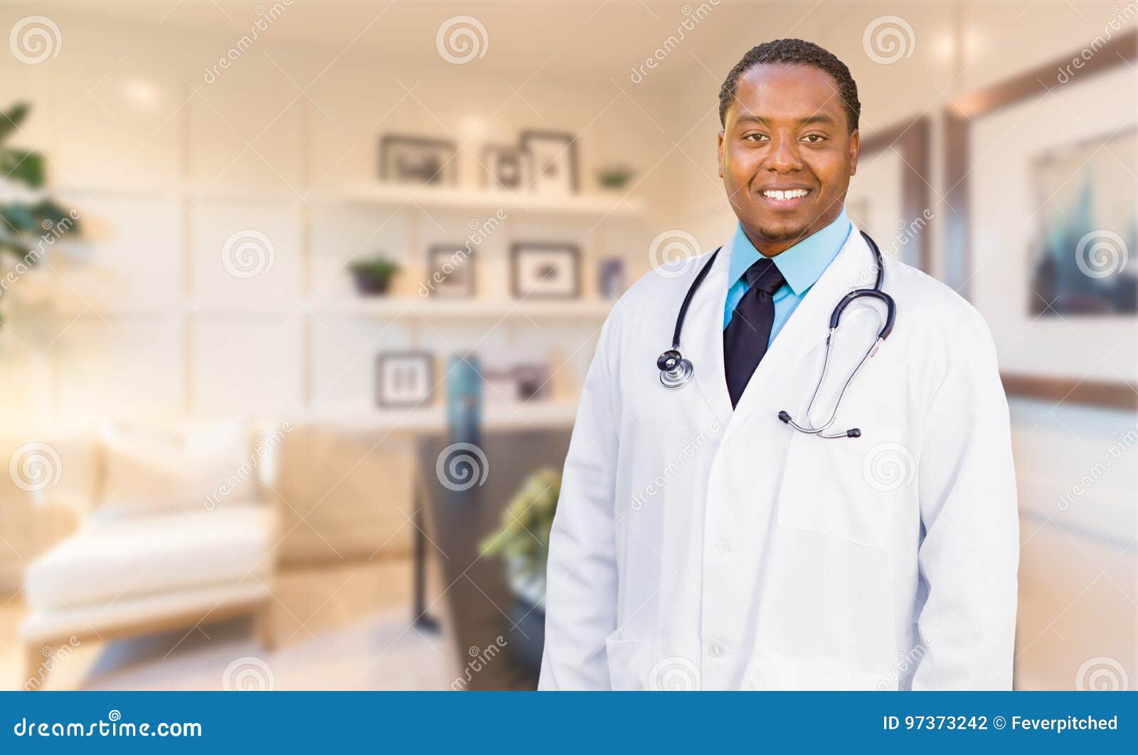 young african american doctor or nurse standing in his office