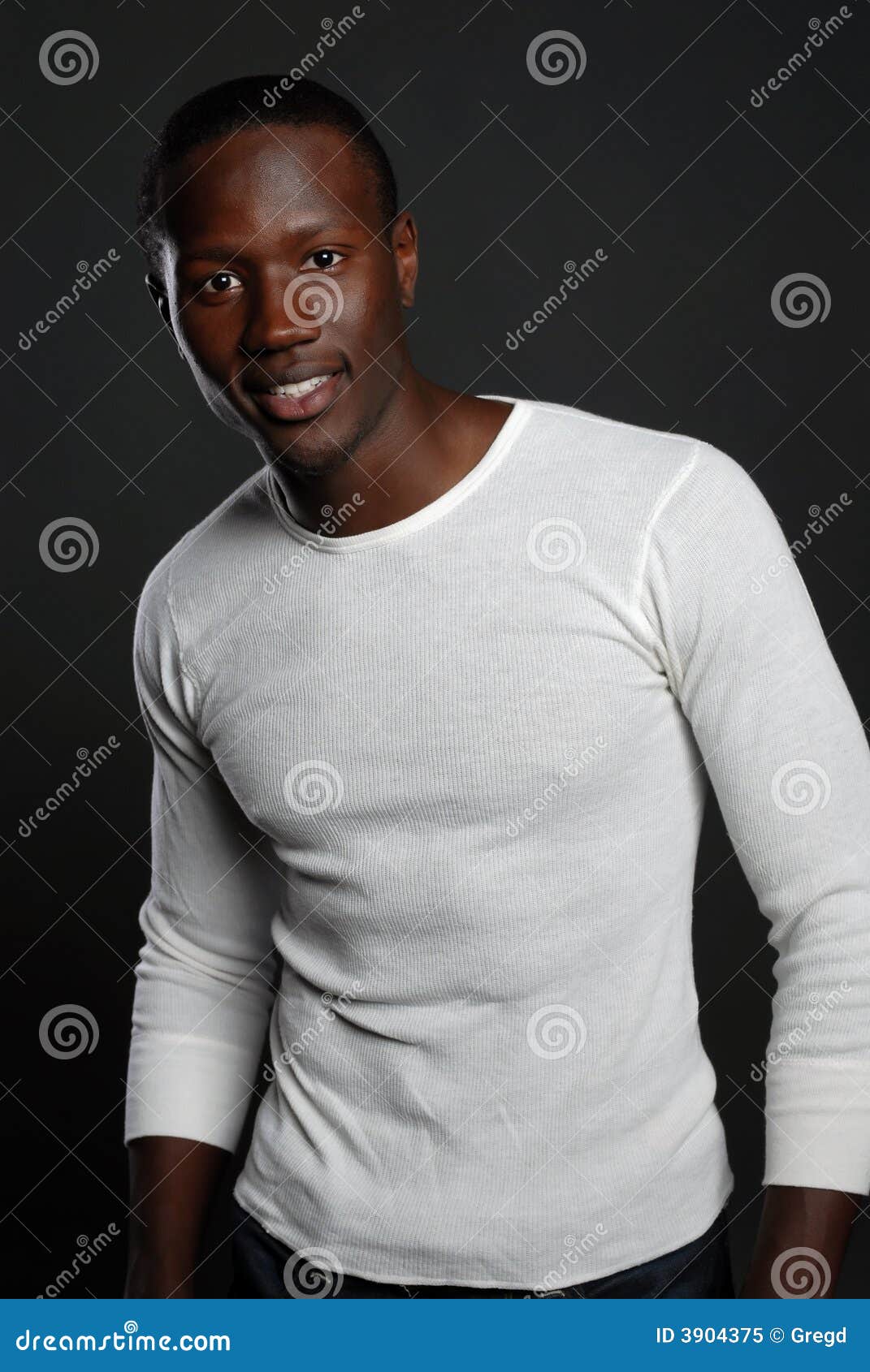 Portrait Of A Young African American Business Man Using A 