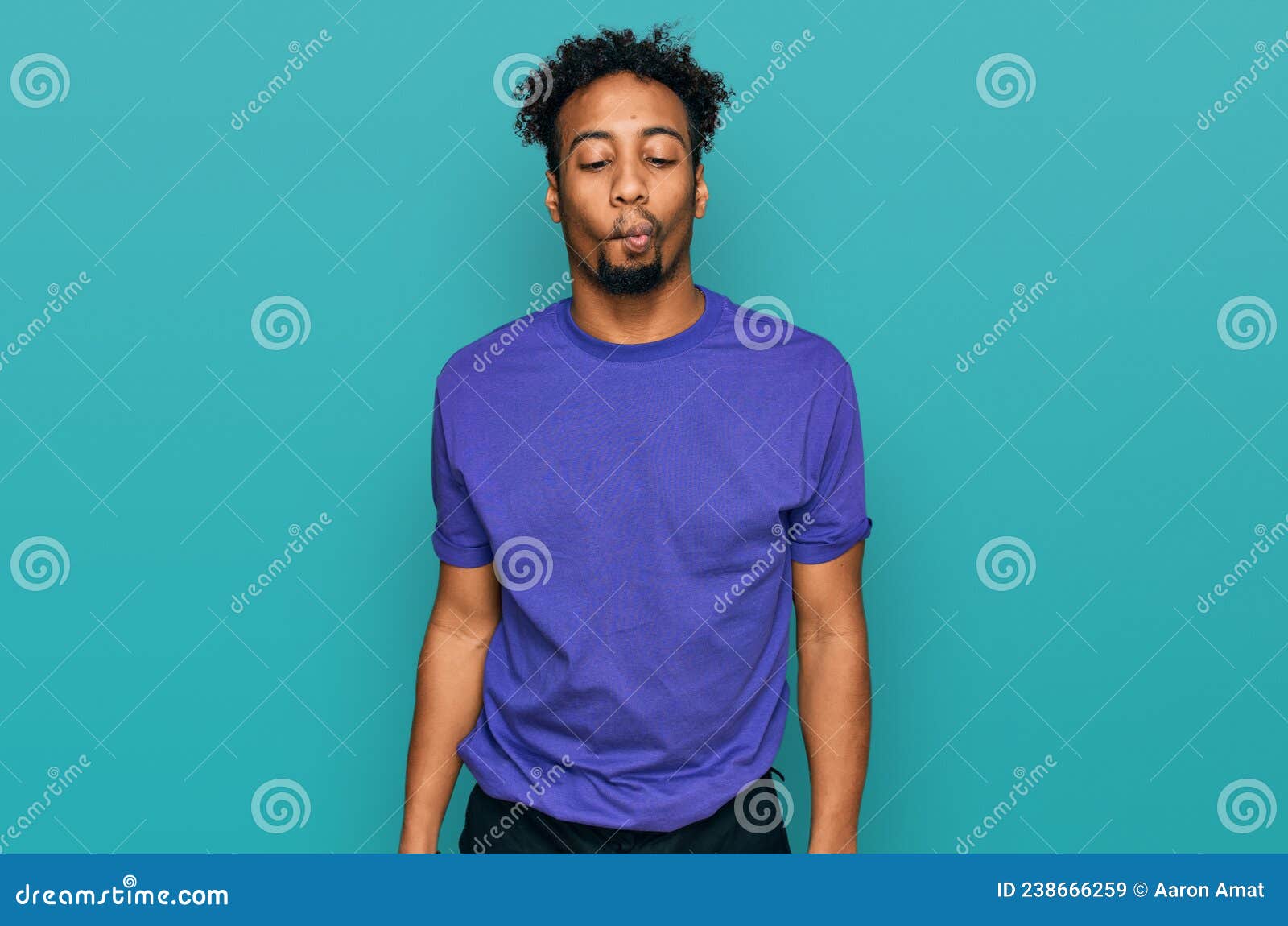 Young African American Man with Beard Wearing Casual Purple T Shirt Making Fish  Face with Lips, Crazy and Comical Gesture Stock Image - Image of facial,  purple: 238666259