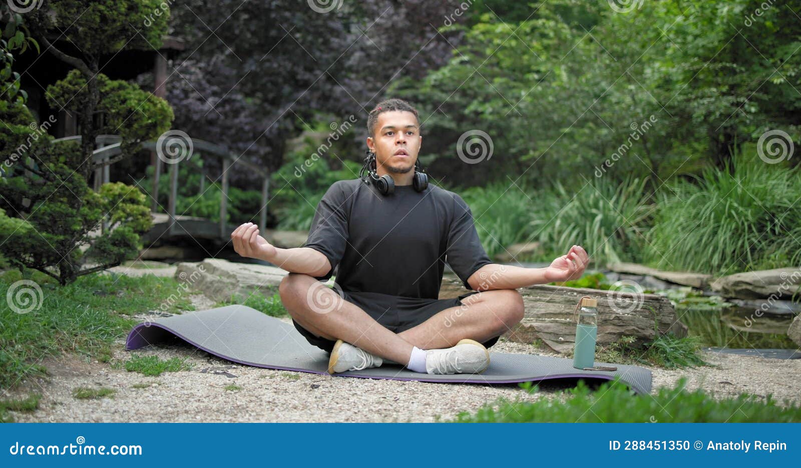 Young African American Spirituality Man Meditating Yoga Asana Sitting ...