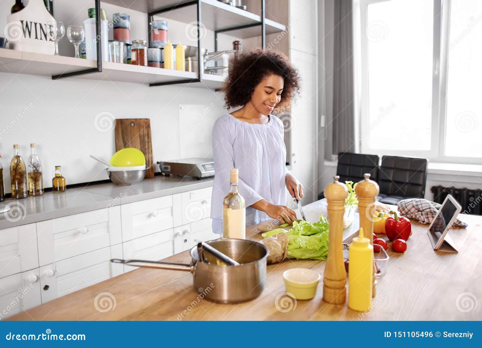 https://thumbs.dreamstime.com/z/young-african-american-woman-cooking-kitchen-young-african-american-woman-cooking-kitchen-151105496.jpg