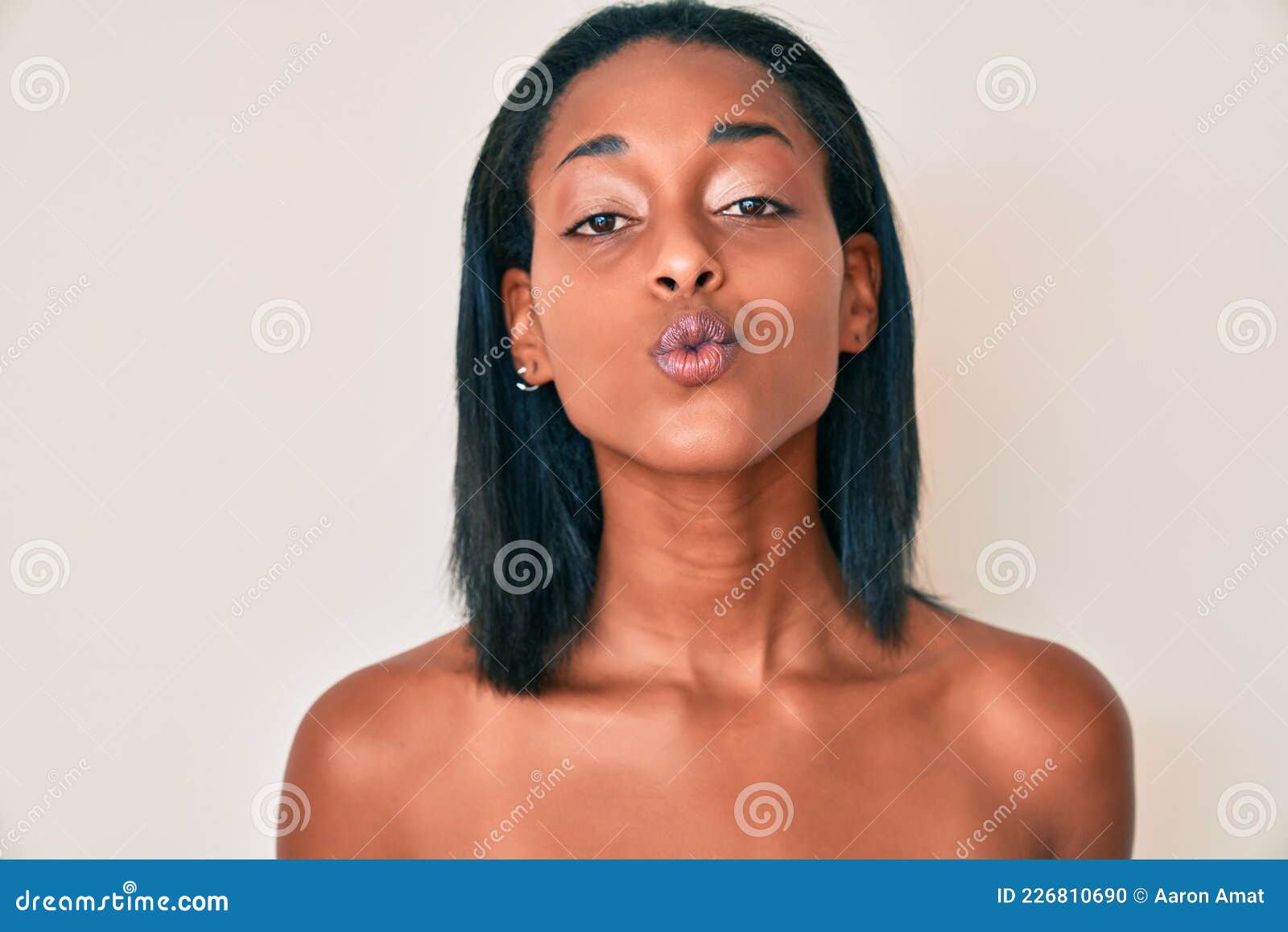 1600px x 1156px - Young African American Woman Standing Topless Showing Skin Looking at the  Camera Blowing a Kiss Being Lovely and Stock Photo - Image of face,  emotion: 226810690