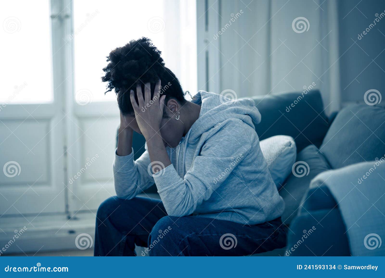 Young African American Woman Suffering from Depression, Anxiety and