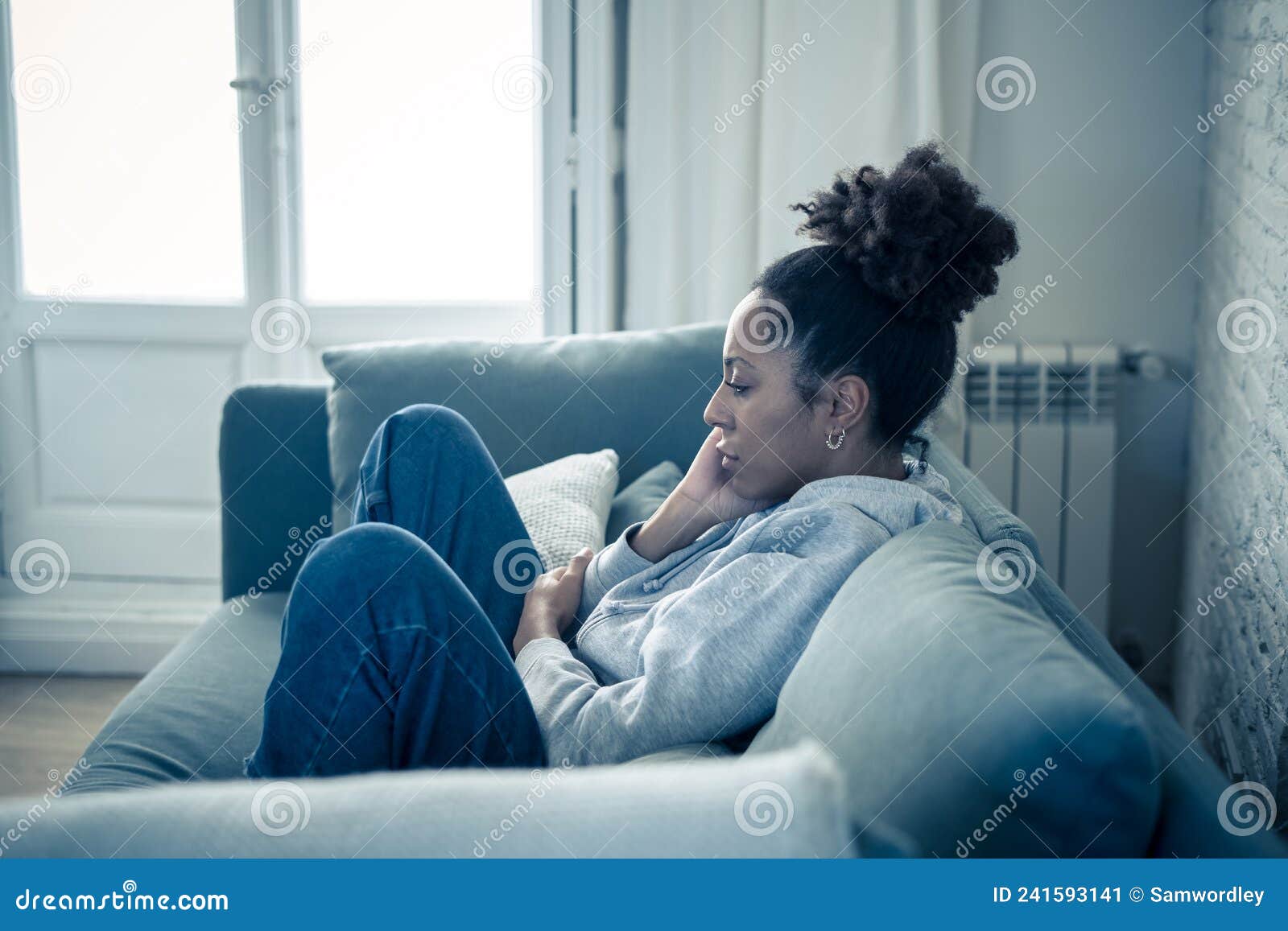 Young African American Woman Suffering from Depression, Anxiety and