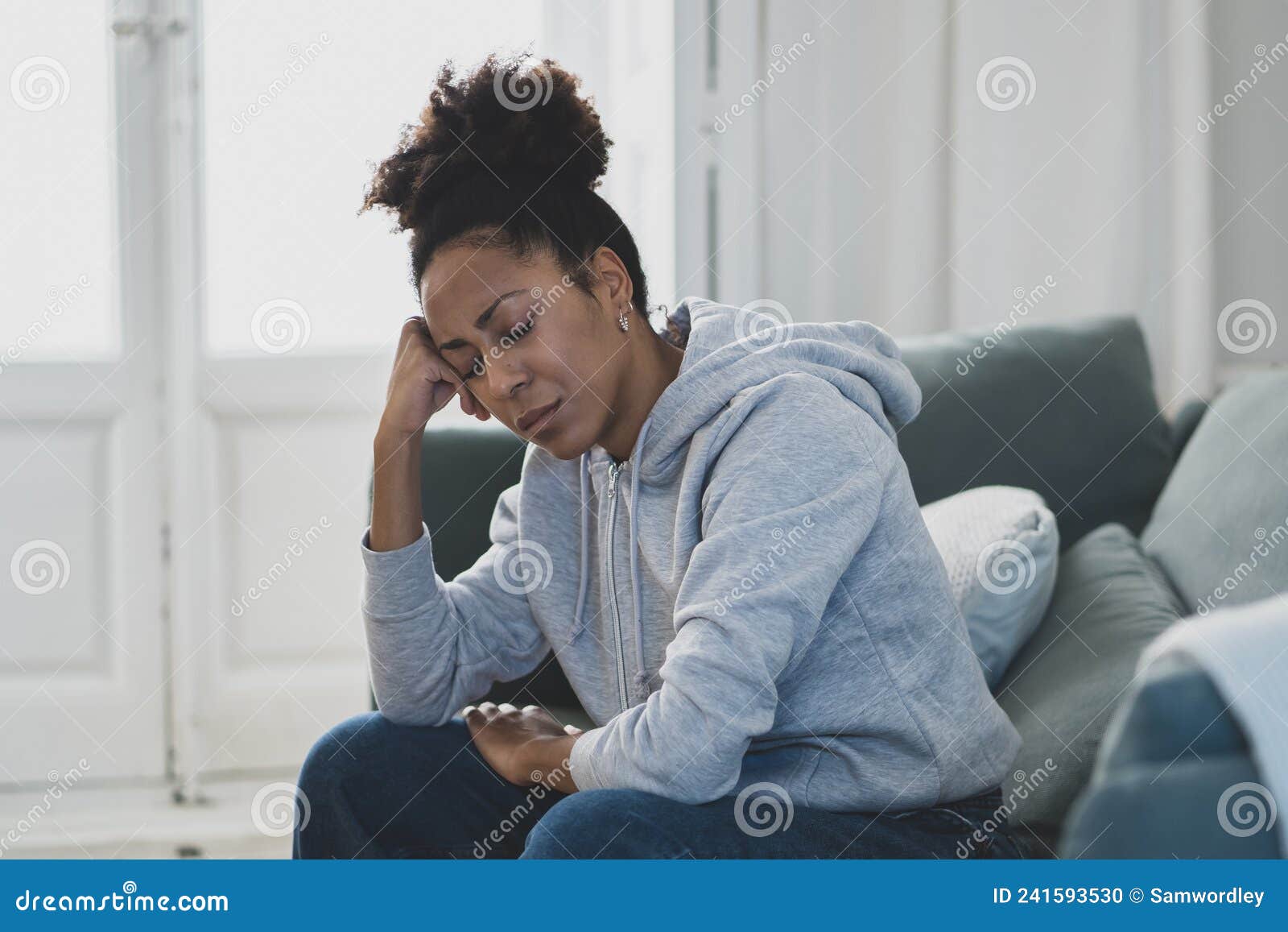 Young African American Woman Suffering from Depression, Anxiety and