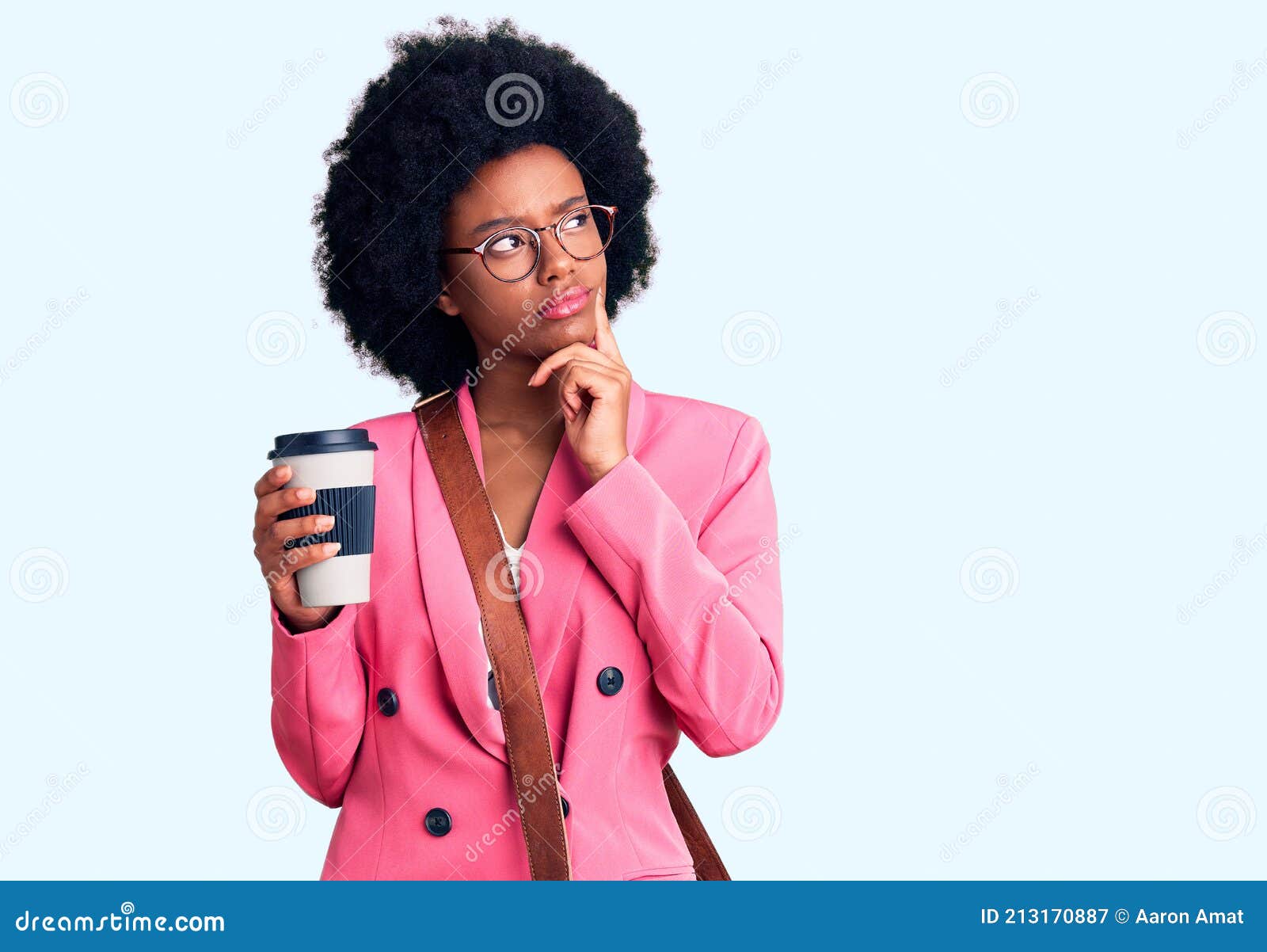 Young African American Woman Wearing Leather Bag and Drinking a Take ...