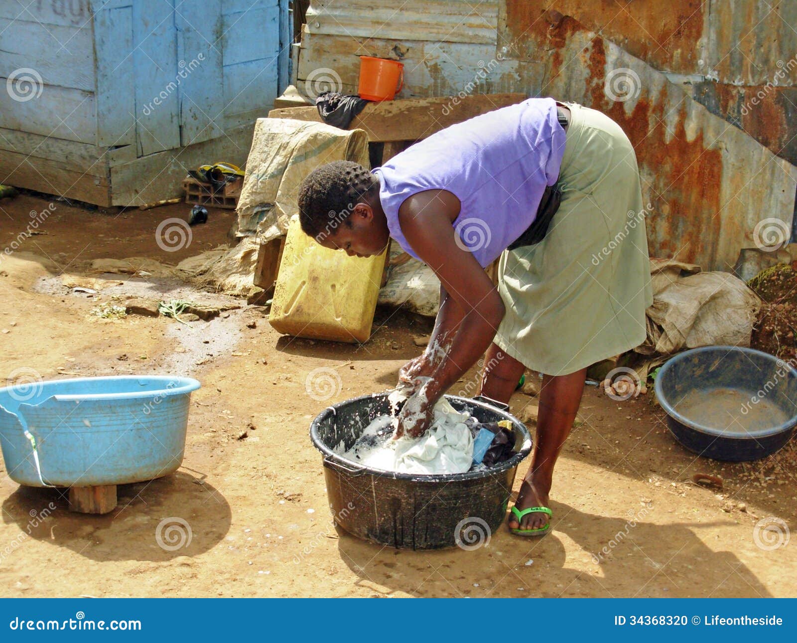 Young African Woman Washing Clothes Urban Uganda Editorial Image - Image: 34368320